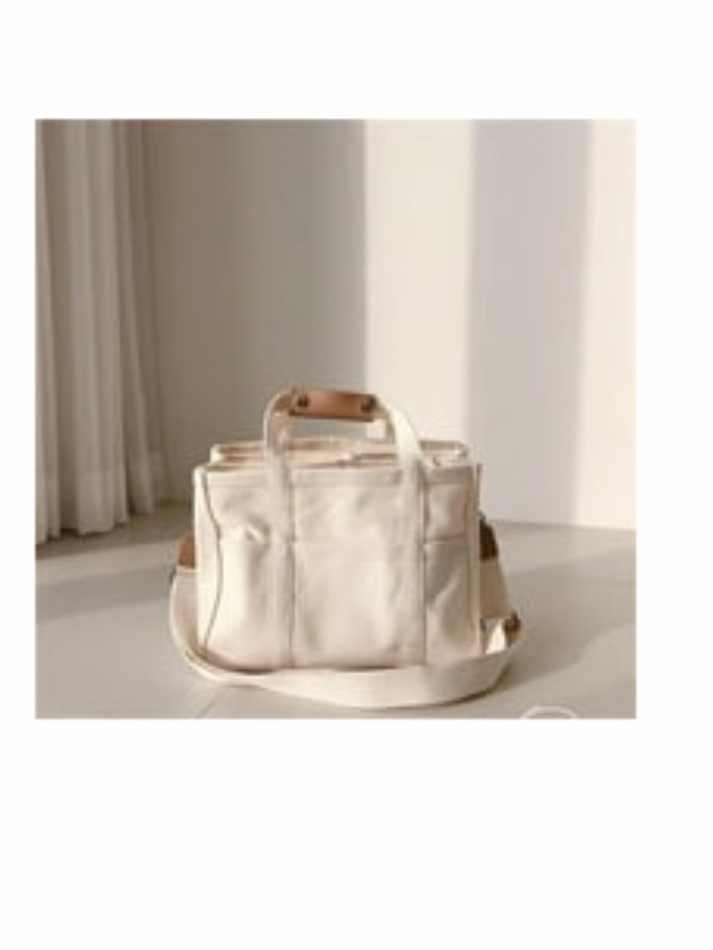 Cream Canvas Tote Bag with Leather Accents. 9.5 in tall, 12in wide. New